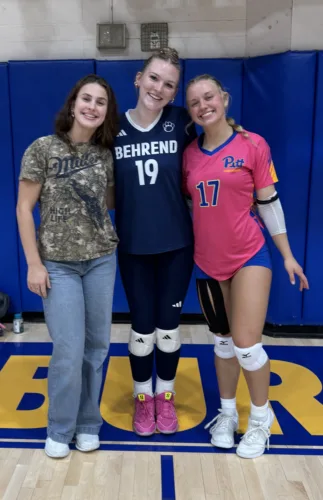 Warren volleyball reunites on college court